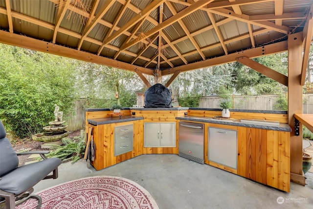 view of patio / terrace with a gazebo and exterior kitchen