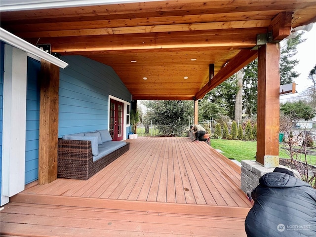 deck with an outdoor hangout area