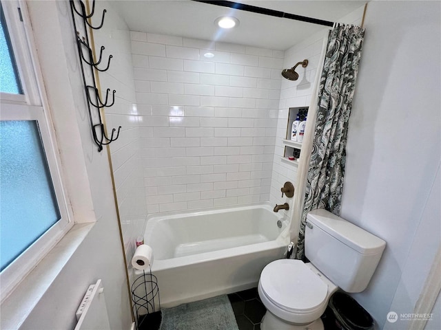 bathroom featuring shower / tub combo, radiator heating unit, tile patterned floors, and toilet