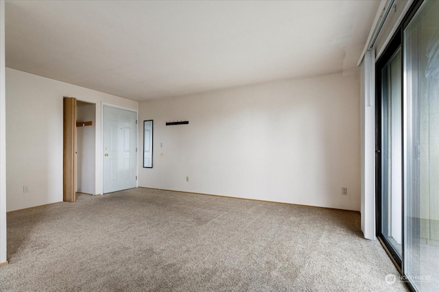 unfurnished bedroom with light carpet