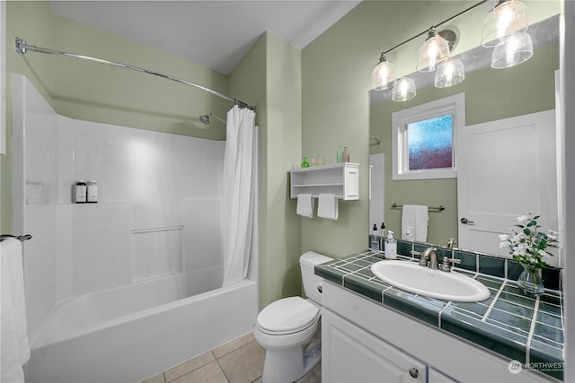 full bathroom with tile patterned floors, vanity, toilet, and shower / bath combination with curtain