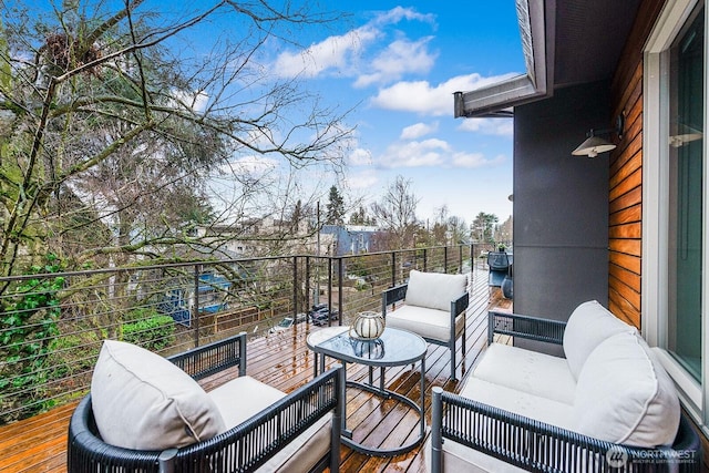 balcony with an outdoor hangout area