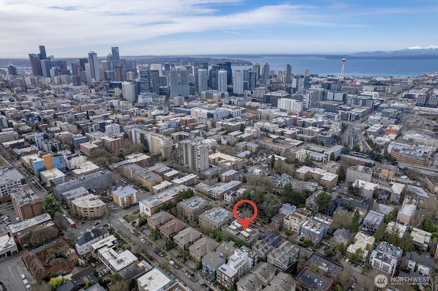 aerial view with a water view and a city view