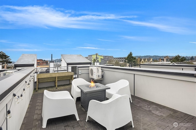 view of patio / terrace featuring a fire pit