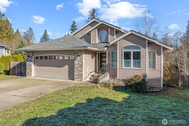 front facade with a garage and a front lawn