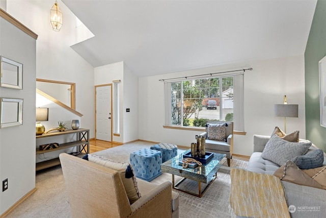 living room with lofted ceiling and a chandelier