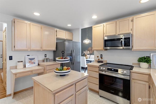 kitchen with decorative light fixtures, a center island, light brown cabinetry, and appliances with stainless steel finishes