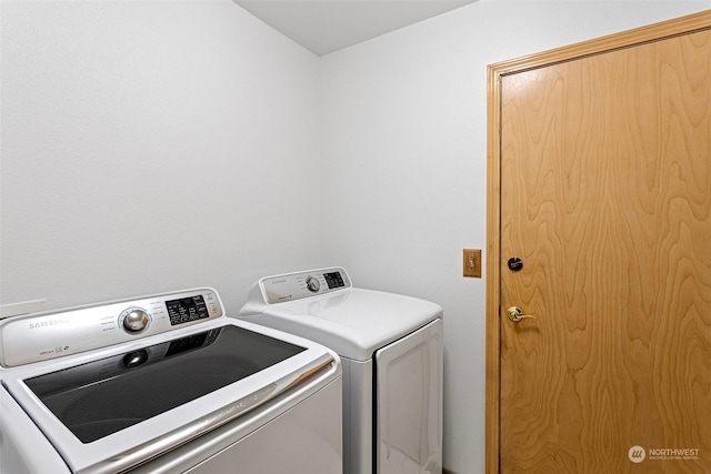 washroom featuring separate washer and dryer