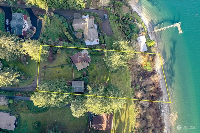 birds eye view of property featuring a water view