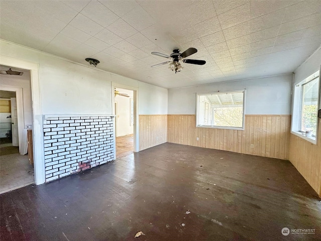 unfurnished room featuring ceiling fan