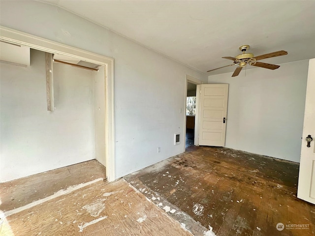 unfurnished bedroom with a closet and ceiling fan