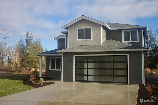 view of front of property with a garage