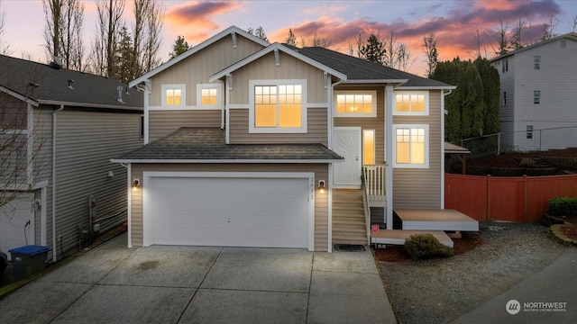 view of front of property with a garage