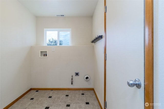 clothes washing area with light tile patterned flooring, washer hookup, hookup for a gas dryer, and hookup for an electric dryer