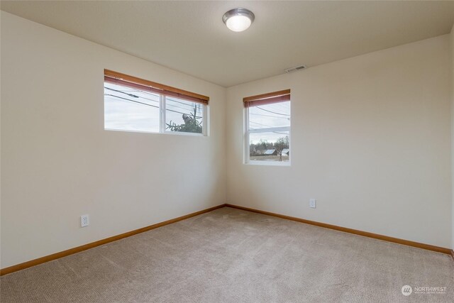 empty room with light carpet