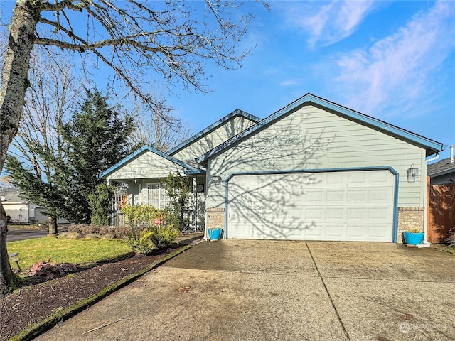 single story home featuring a garage