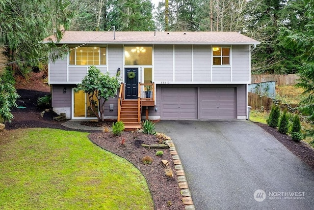 raised ranch with a garage