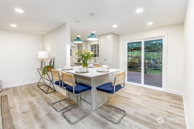 dining room featuring light wood-type flooring