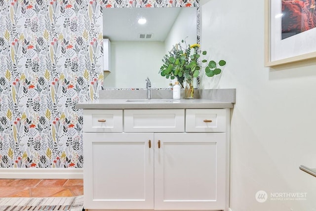 bathroom featuring tile patterned floors and vanity