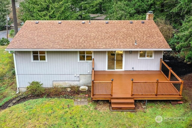 rear view of house with a deck