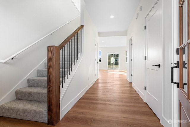 interior space with hardwood / wood-style flooring