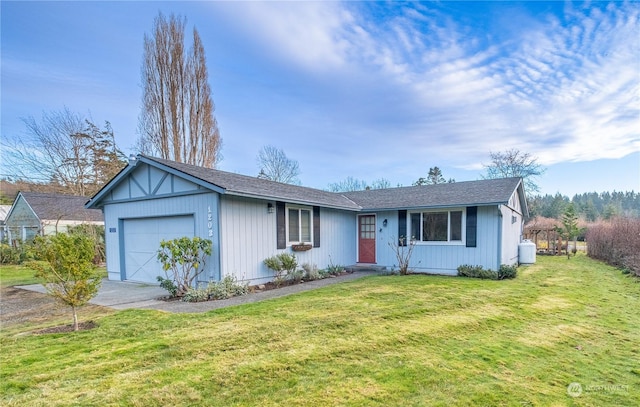 ranch-style home with a garage and a front lawn