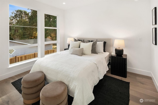 bedroom with light wood-type flooring