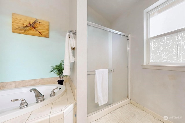 bathroom with tiled tub