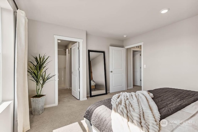 bedroom featuring light colored carpet