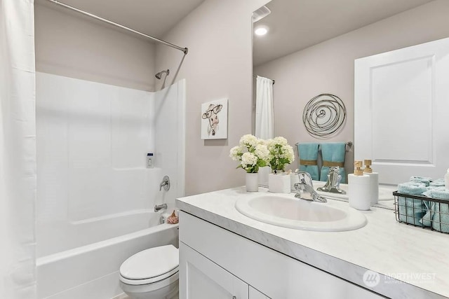 full bathroom featuring shower / bath combination with curtain, toilet, and vanity