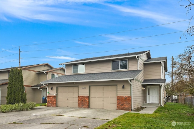 view of front of home with a garage