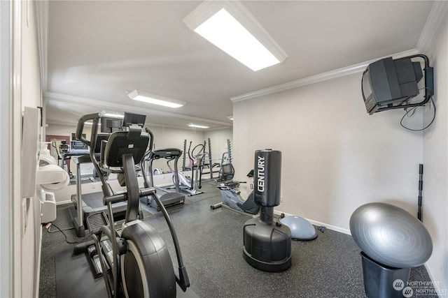 exercise room with ornamental molding