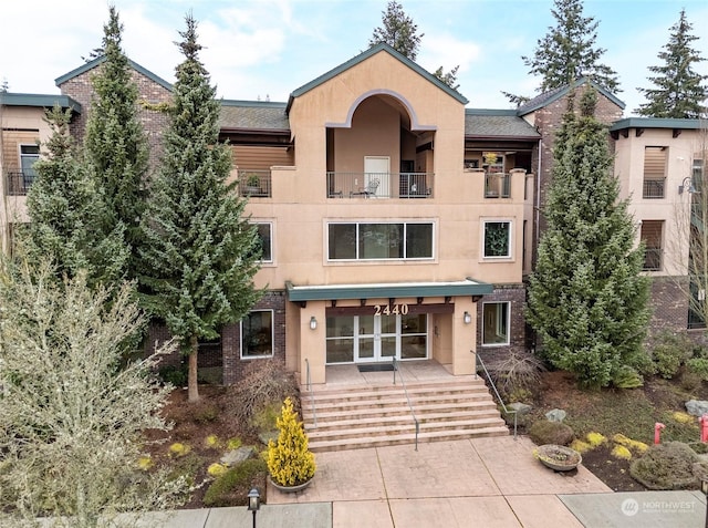 view of front of house with a balcony