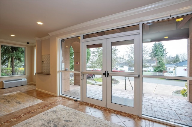 doorway with crown molding, french doors, an AC wall unit, and light tile patterned floors