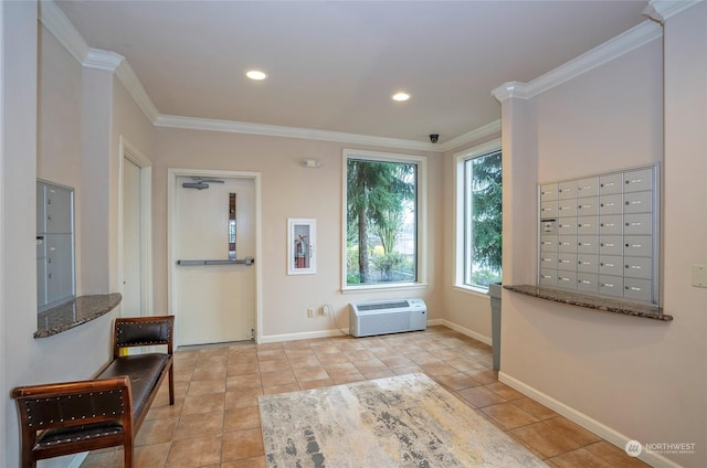 sitting room featuring a mail area, an AC wall unit, light tile patterned flooring, and crown molding