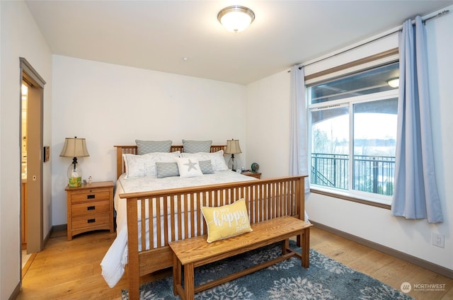 bedroom featuring light wood-type flooring