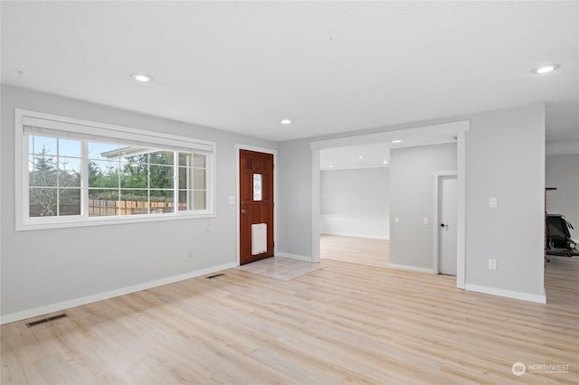 foyer entrance featuring light hardwood / wood-style floors