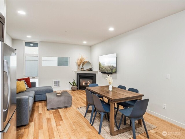 dining room featuring light hardwood / wood-style floors