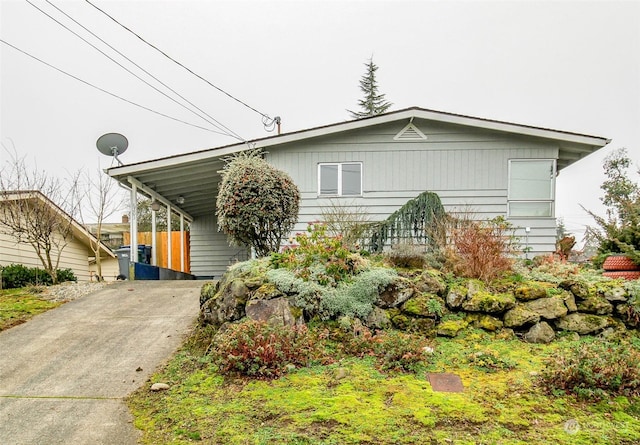 view of front of property with a carport