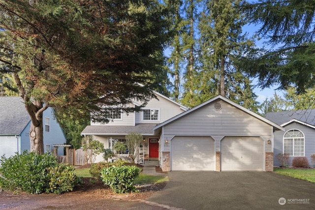 view of front of home with a garage