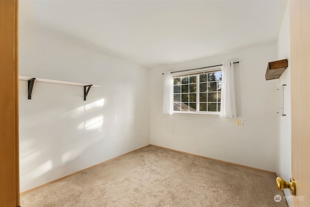 empty room with carpet flooring