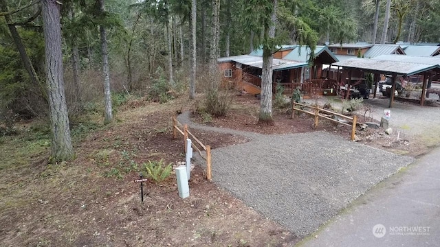 view of yard with a carport