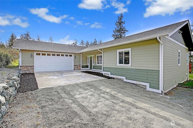 ranch-style home with a garage