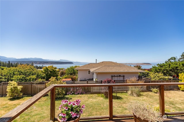 view of yard with a water and mountain view