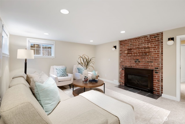 living room featuring a fireplace and carpet