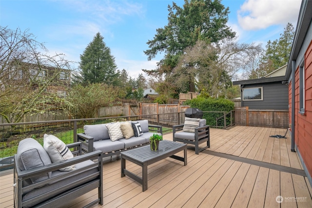 deck featuring outdoor lounge area