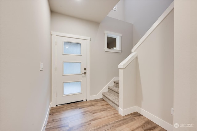 foyer with light hardwood / wood-style flooring