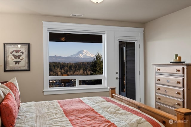 bedroom with a mountain view