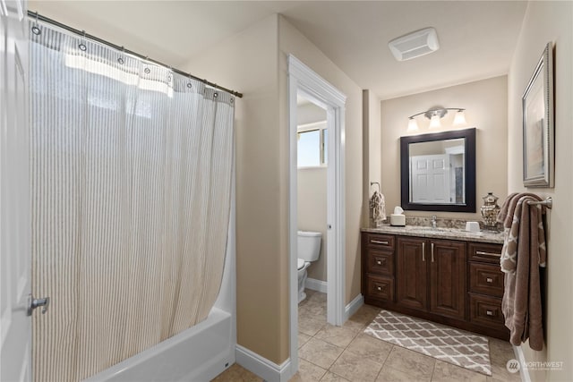 full bathroom featuring vanity, shower / tub combo, tile patterned floors, and toilet