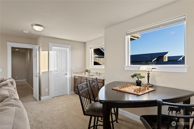 view of carpeted dining room